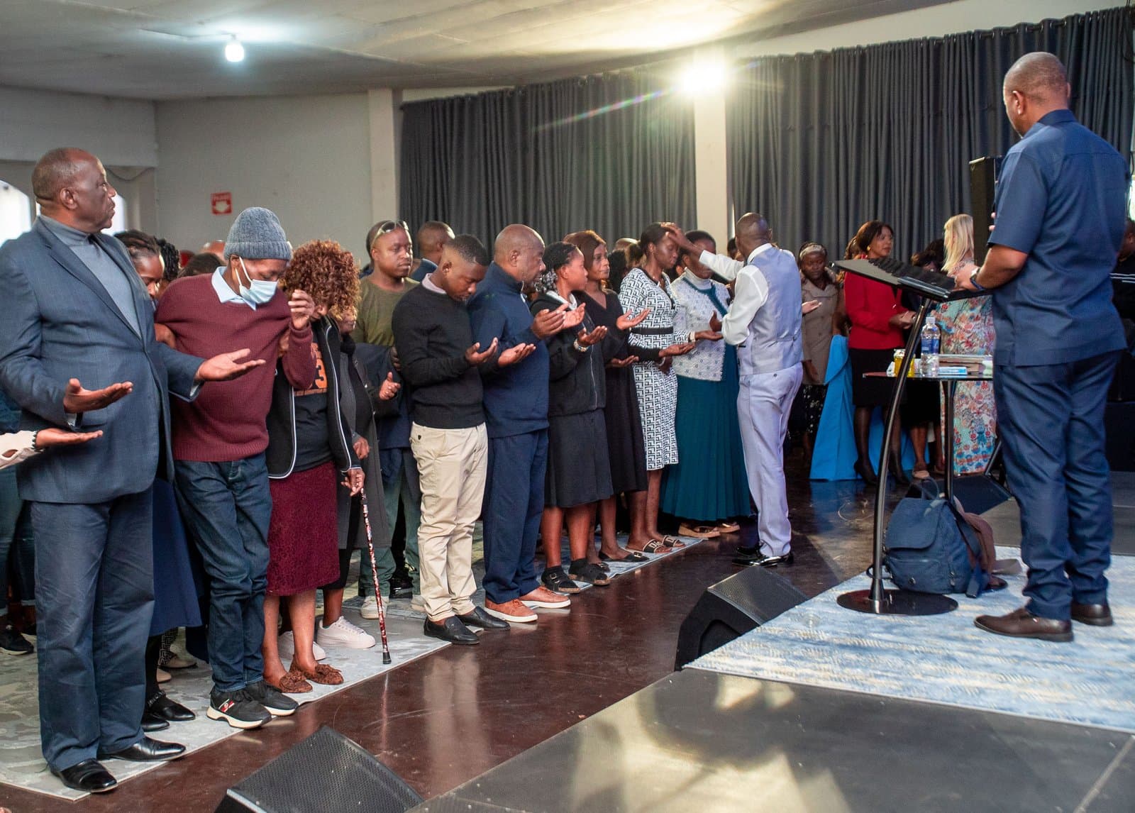 Group prayer session at Healing Rooms Zimbabwe