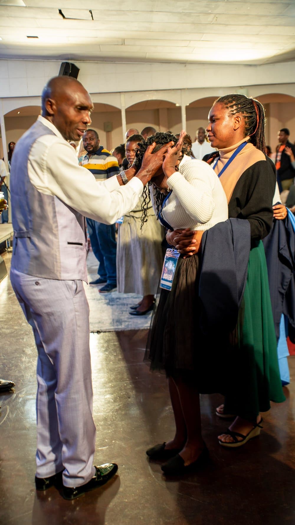 Prayer minister praying over someone